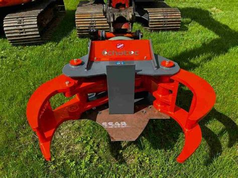 rotating tree shear for excavator